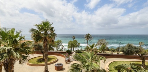 Promenade and landscaped area overlooking the sea at Kiryat Sanz Beach