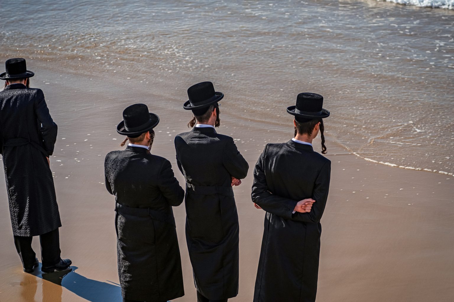 Beachgoers on the stairs leading to Kiryat Sanz Beach
